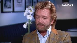 Noel speaking about his suicide attempt during an interview